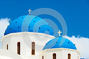 Greek church with blue dome in Santorini