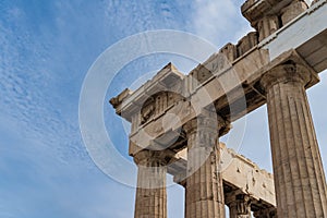 Greek columns in the Parthenon against the sky, close-up photo