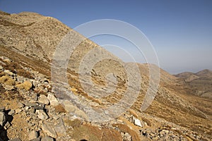 Greek Crete mountain range with highest mountain Ida Psiloritis, very dry hard terrain with sharp rocks and stones, natura park