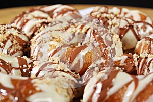 Greek donut with syrup and chocolate cream loukoumades