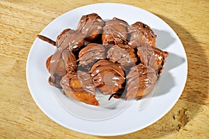 Greek donut with syrup and chocolate loukoumades