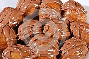 Greek donut with syrup and chocolate loukoumades