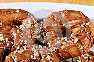 Greek donut with syrup and chocolate loukoumades