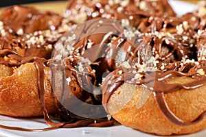 Greek donut with syrup and chocolate loukoumades