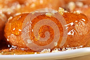 Greek donut with syrup and honey