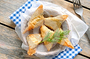 Greek feta and spinach filo pastry triangles photo