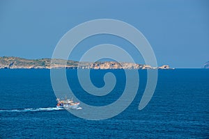 Greek fishing boat in Aegean sea near Milos island, Greece