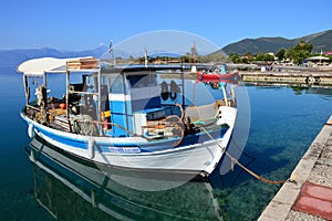 Greek Fishing Caique in Town Harbour, Greece