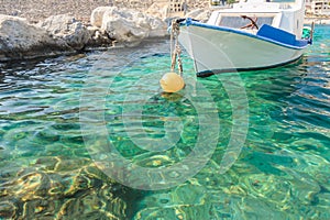 Greek fishing motorboat floating on Kalymnos