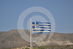 Greek flag on the background of the mountains