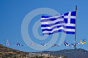 A Greek flag on the Cycladic island of Ios, Greece
