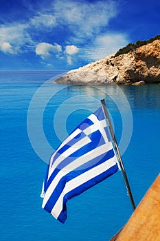 Greek flag in front of Porto Katsiki beach, Lefkada