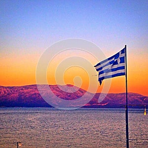 Greek flag at sunset