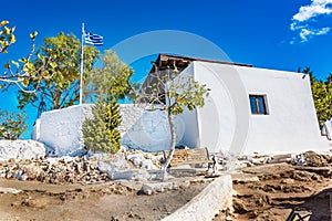Greek flag and Tsambika Monastery, RHODES, GREECE