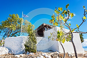 Greek flag and Tsambika Monastery, RHODES, GREECE