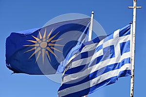 Greek flag and unofficial flag of the Greek region Macedonia