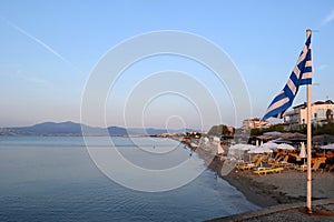 Thessaloniki, Greece - September 1 2017: View of Agia Triada suburb in Thessaloniki, sea and greek flag waving.