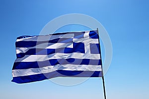 Greek flag waving on a pole