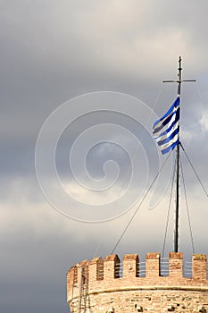 Greek flag on white tower