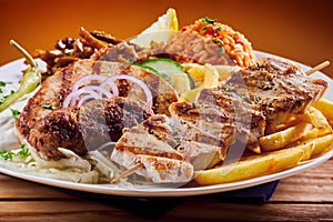 Greek grill plate with souvlaki and souzuki steak