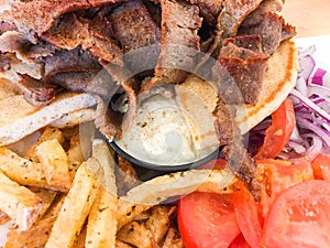 Greek gyros with fried potatoes