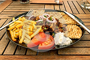 Greek gyros plate with french fries