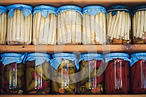 Greek homemade jam and canned food on the shelves of local shops