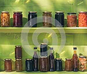 Greek homemade jam and canned food on the shelves of local shops