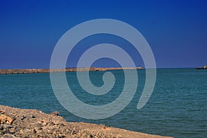 Greek landscape, sea, with hills in the background