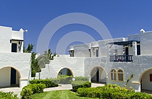 Greek mediterranean bungalow architecture.