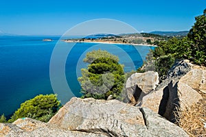 Greek mediterranean coast with beautiful blue tones of Aegean sea in Sithonia