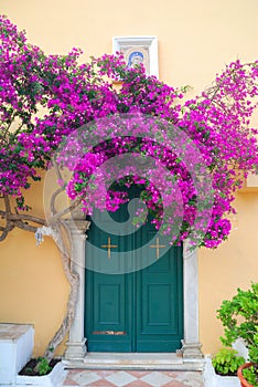 Greek monastery door with flowers