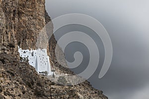 Greek monastery on the rock of cyclade island