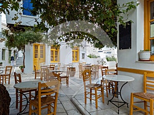Greek outdoors tavern restaurant at Tinos island, Pyrgos village Cyclades Greece