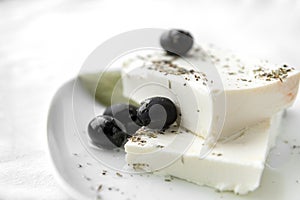 Greek pickled feta cheese, black olives