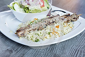 Greek Pork Soulaki Served on a Bed of Rice 1 photo