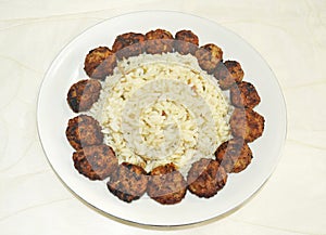 Greek rice pilaff with meatballs photo