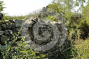 Greek-Roman  ancient ruins, abandoned places. Rock stone wall.