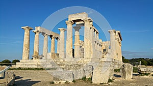 Greek ruins at the Temple of Aphaia on island of Egina ancient roman columns golden hour historic remains Greece Mediterranean sea