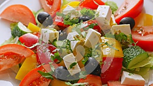 Greek salad with feta, tomatoes and other vegetables, healthy food