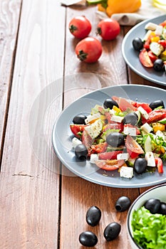 Greek salad with fresh tomatoes, peppers and cucumbers