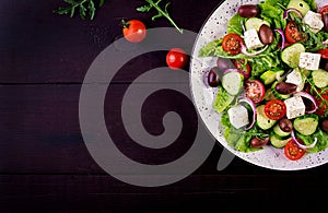 Greek salad with fresh vegetables, feta cheese and kalamata olives.