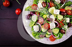 Greek salad with fresh vegetables, feta cheese and kalamata olives.