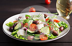 Greek salad with fresh vegetables, feta cheese and kalamata olives