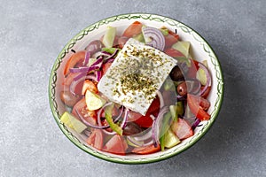 Greek salad with fresh vegetables, feta cheese and kalamata olives. Healthy food