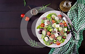 Greek salad with fresh vegetables, feta cheese and kalamata olives