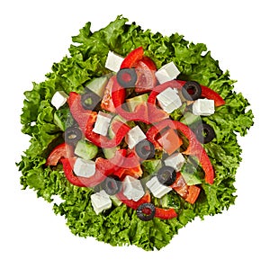 Greek salad with fresh vegetables, feta cheese, olives, lettuce isolated on white