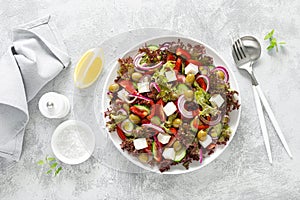 Greek salad with fresh vegetables, lettuce and feta cheese