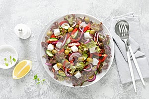 Greek salad with fresh vegetables, lettuce and feta cheese