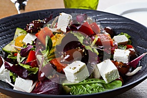 Greek salad or horiatiki salad is a salad in Greek cuisine. Greek salad is made with tomatoes